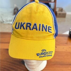 Ukraine kids soccer cap from Eruo2012 tournament. Fair condition.